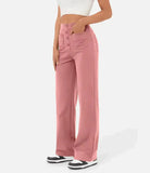 Elsa Lumina Wear high-waist black trousers with pockets, featuring a comfortable fit and stylish design.