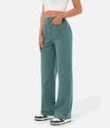 Elsa Lumina Wear high-waist black trousers with pockets, comfortable fit, tailored for a stylish, casual look.