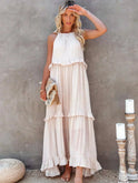 Lumina Wear Laila halter ruffle maxi dress in apricot, flowing fabric with ruffle details, perfect for summer occasions.