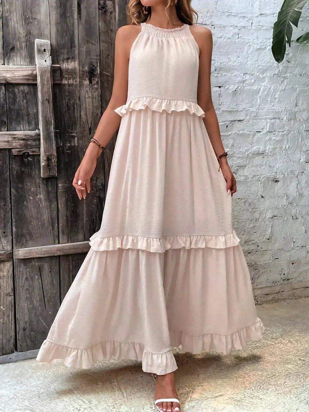 Lumina Wear Laila halter ruffle maxi dress in apricot, flowing fabric with ruffle details, perfect for summer occasions.