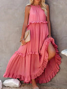 Laila halter ruffle maxi dress in apricot by Lumina Vancouver, flowing fabric with ruffle details, perfect for summer occasions.