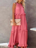 Laila halter ruffle maxi dress in apricot by Lumina Vancouver, flowing design with ruffle details, perfect for summer occasions.