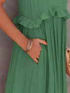 Lumina Vancouver Laila halter ruffle maxi dress in apricot, flowing fabric with ruffle details, perfect for summer occasions.