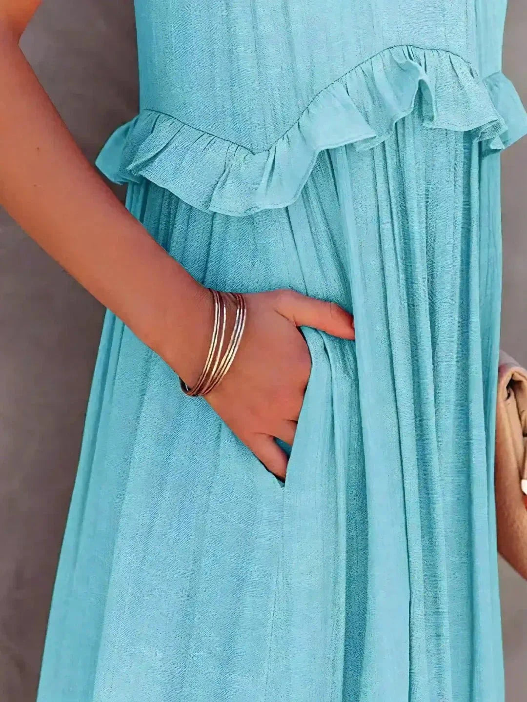 Laila Lumina Vancouver halter ruffle maxi dress in apricot, flowing design with ruffled neckline and elegant style.
