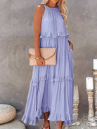 Laila Lumina Vancouver halter ruffle maxi dress in apricot, flowing fabric with ruffle details, perfect for summer occasions.