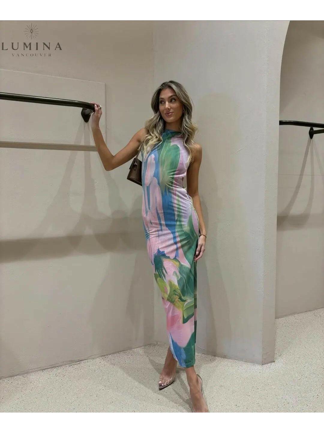 Emilia maxi wedding guest dress by Lumina Vancouver, featuring elegant flowy fabric and a stylish design for special occasions.