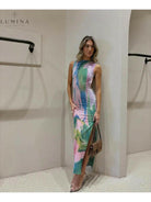 Emilia Kyllikki maxi dress by Lumina Vancouver, elegant wedding guest gown in soft fabric with flowing silhouette.