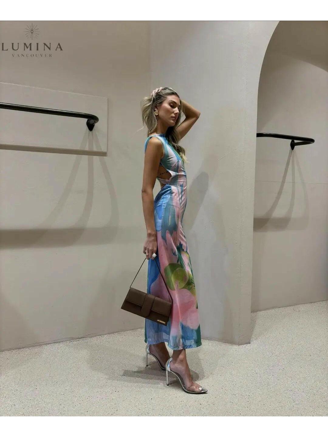 Elegant Emilia Maxi Dress by Lumina Vancouver, perfect for wedding guests, featuring flowing fabric and stylish design.