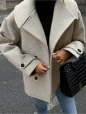 Lumina Wear Emily double-breasted taupe jacket with button details, stylish women's outerwear.