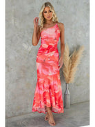 Blue Zelie floral summer dress by Lumina Vancouver, perfect for wedding guests, with a lightweight, flowy design and vibrant floral pattern.