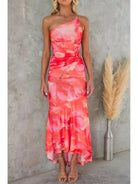 Blue Zelie floral summer wedding guest dress by Lumina Vancouver, featuring a lightweight, elegant design with floral patterns.