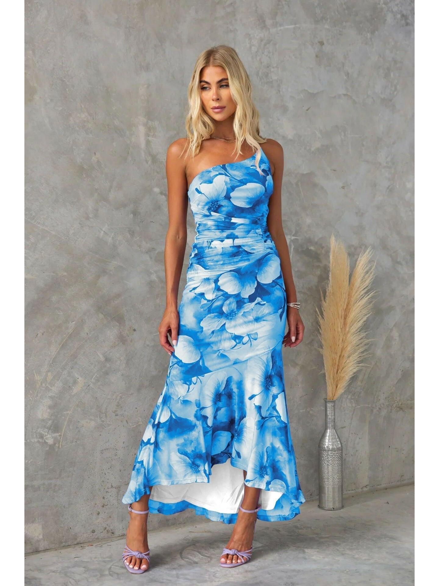 Blue Zelie floral summer wedding guest dress by Lumina Vancouver, featuring a lightweight, elegant design perfect for warm-weather events.