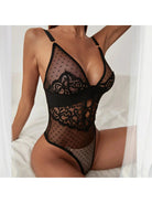Lumina Vancouver Esmee's Bodysuit in black, fitted one-piece with long sleeves and scoop neckline, displayed on a model.