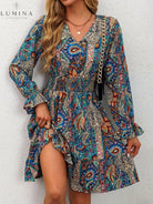 Blue Boho Elegance Dress by Lumina Vancouver featuring flowy fabric and intricate details, perfect for stylish occasions.
