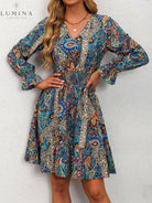 Blue Boho Elegance Dress by Lumina Vancouver, featuring flowy fabric and intricate design details, perfect for stylish occasions.
