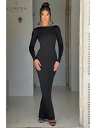 Light blue Evanna boat-neck backless maxi dress by Lumina Vancouver, featuring a flowing silhouette and elegant design.