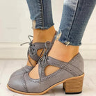 Black Evelyn T-strap heels by Lumina Wear, stylish women's shoes with modern design and elegant T-strap detail.