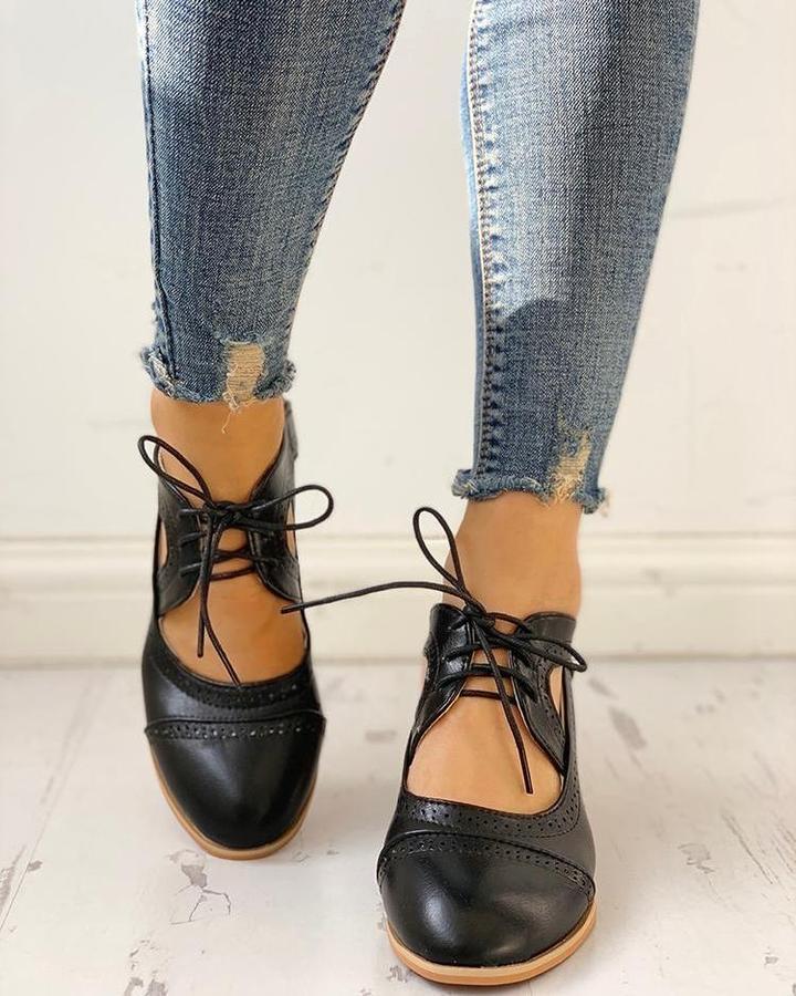 Black Lumina Wear Evelyn T-strap heels for women featuring an elegant design with a modern touch and stylish heel.