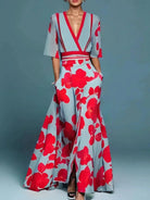 Red Evie elegant dress with floral pattern from Lumina Vancouver's Dresses Collection, featuring a stylish and feminine design.