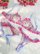 Pink Fantasy Bloom embroidery lingerie set by Lumina Vancouver with three matching pieces, delicate floral details and feminine design.