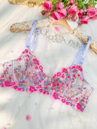 Pink fantasy bloom embroidery lingerie set, Lumina Vancouver 3-piece satin and lace bra, panties, and garter belt on a model.