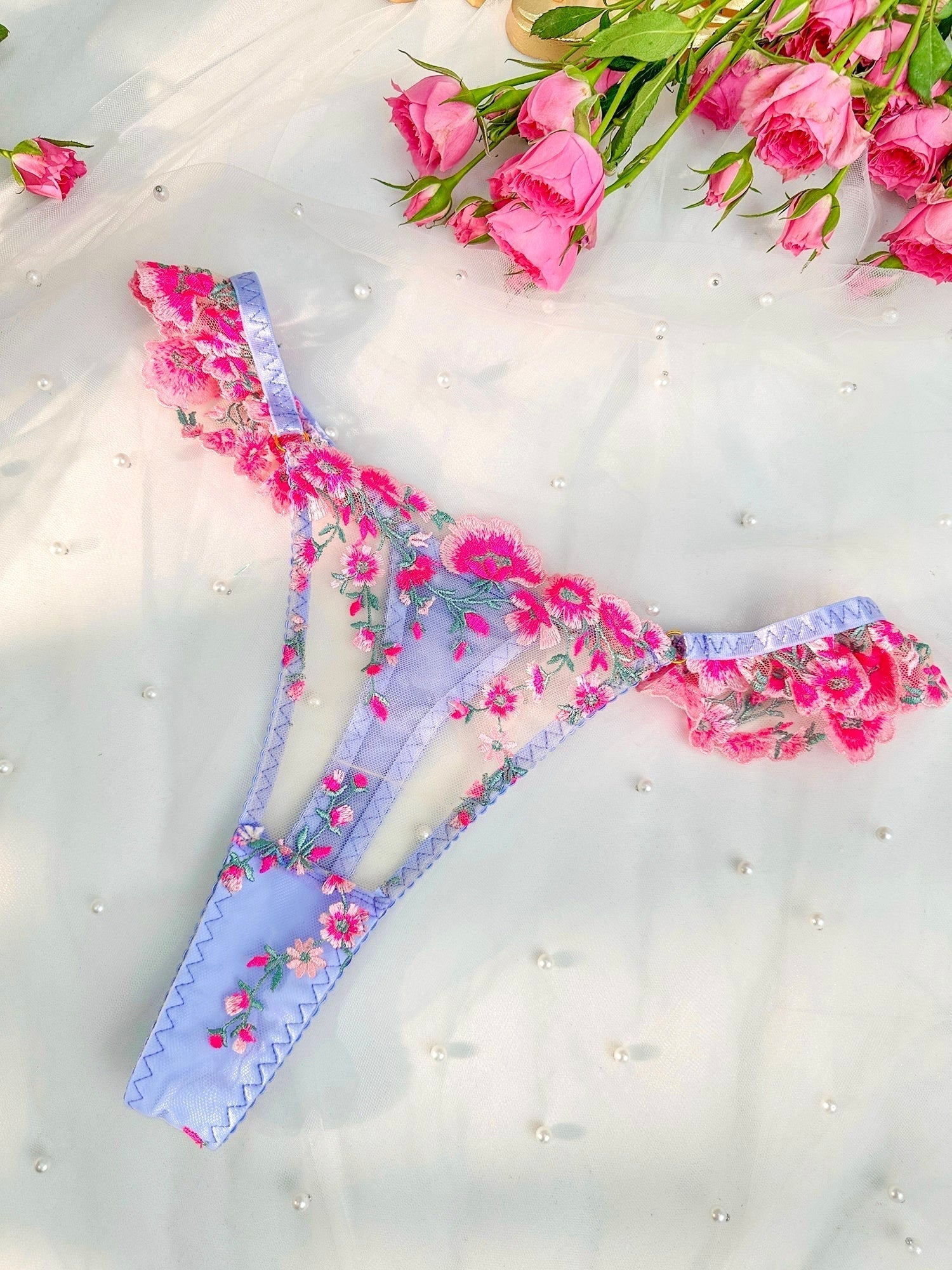 Pink embroidery lingerie set by Lumina Vancouver, includes three-piece fantasy pink bloom design with delicate lace details.