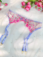 Pink fantasy bloom embroidery lingerie set with three pieces, from Lumina Vancouver, featuring delicate floral details and soft fabric.