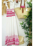 Farah™ Bohemian summer maxi dress by Lumina Vancouver, flowing fabric, floral pattern, sleeveless design, perfect for warm weather.