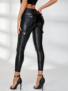 Black faux leather cargo leggings with scrunch bum and pockets by Lumina Vancouver, shown on a model.