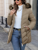Black Lumina Wear Florence quilted puffer coat with faux-fur hood, stylish winter outerwear with insulated design.