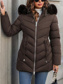 Black Lumina Wear Florence quilted puffer coat with faux-fur hood, stylish winter coat with a padded design and cozy fur trim.
