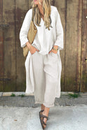 Navy blue Florence relaxed elegance tunic top by Lumina Wear paired with matching pants, casual and stylish outfit.