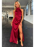 Burgundy Florencia halterneck sleeveless slit maxi dress by Lumina Wear, shown on a model, suitable for elegant occasions.