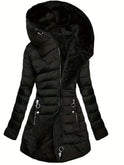 Black Freya puffer coat by Lumina Wear with fleece lining and oversized hood, styled for cozy winter warmth.
