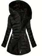 Black Freya puffer coat with fleece lining and oversized hood by Lumina Wear, designed for warmth and comfort.