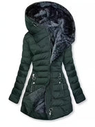 Black Freya puffer coat by Lumina Wear with fleece lining and oversized hood, shown on a model.