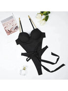 Lumina Vancouver Gabriella's Bodysuit, sleek black bodysuit with fitted design, shown on a model.