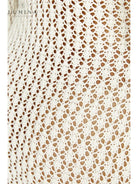 Elegant white Giana dress by Lumina Vancouver, perfect for holiday vibes, shown on a model with stylish details.