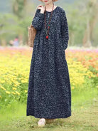 Giorgia vintage floral printed dress by Lumina Vancouver featuring a blue floral pattern and a feminine, flowy design.