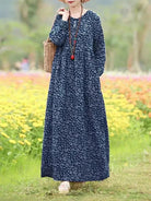 Giorgia vintage floral printed dress by Lumina Vancouver, featuring blue fabric and a classic, elegant design.