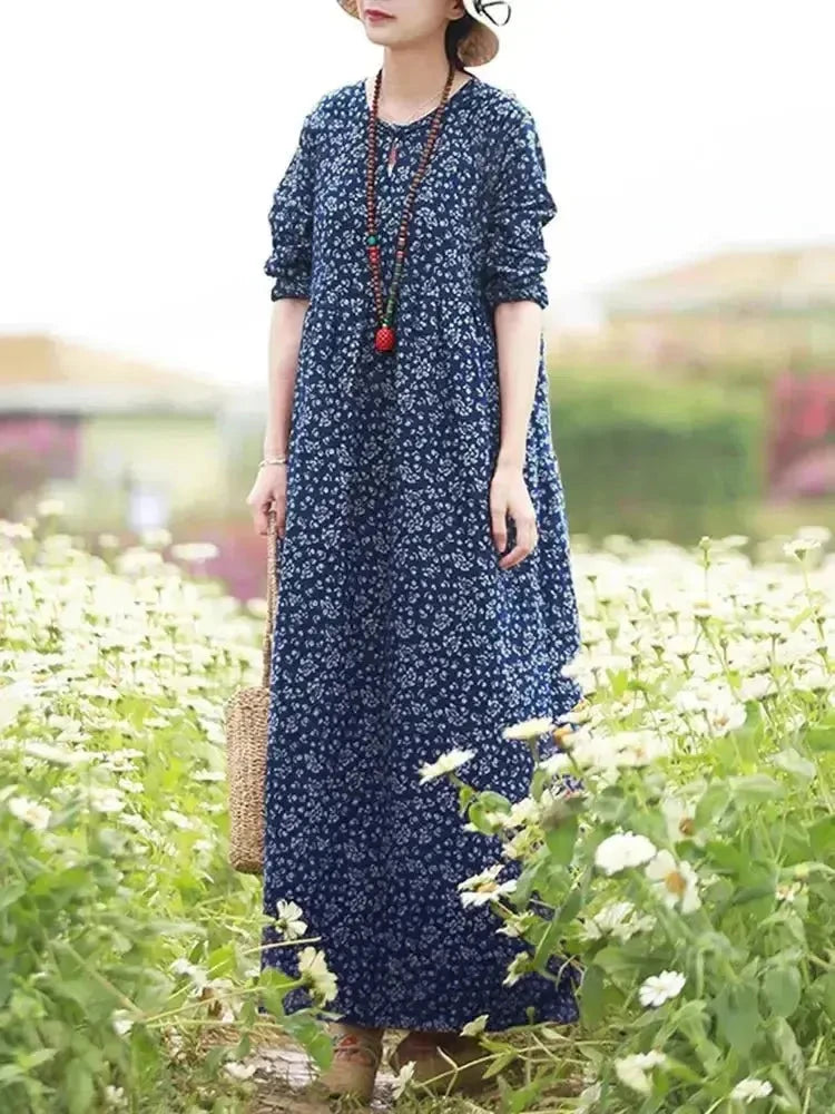 Blue vintage floral printed dress by Lumina Wear, featuring a feminine design and elegant fabric, perfect for casual or semi-formal wear.