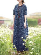 Giorgia vintage floral printed dress by Lumina Vancouver, featuring blue fabric and elegant design, suitable for casual or dressy occasions.