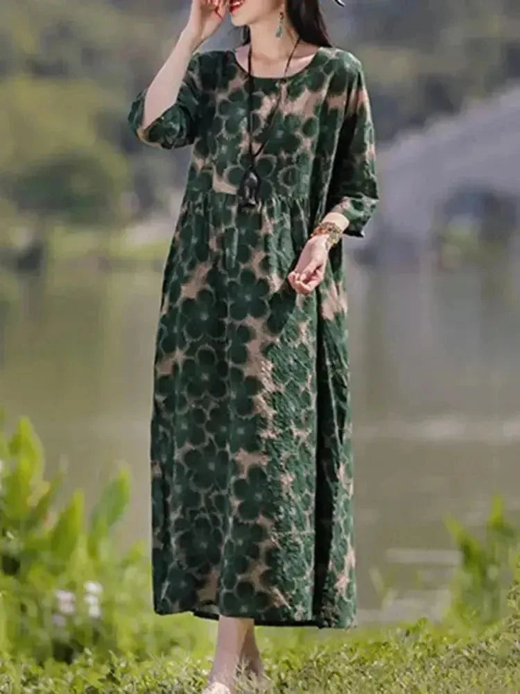 Giorgia vintage floral printed dress by Lumina Vancouver, blue fabric with a classic floral pattern, sleeveless design.