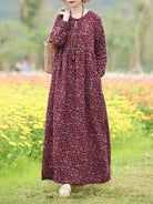Giorgia vintage floral printed dress by Lumina Vancouver, blue fabric with elegant floral pattern, short sleeves and fitted waist.