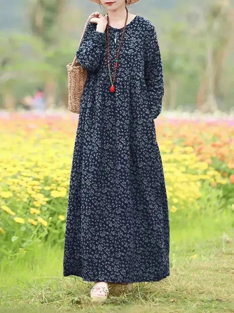 Giorgia vintage floral printed dress by Lumina Vancouver, featuring a blue fabric and elegant design.