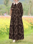 Giorgia vintage floral printed dress by Lumina Vancouver, showcasing a blue floral pattern and elegant design.