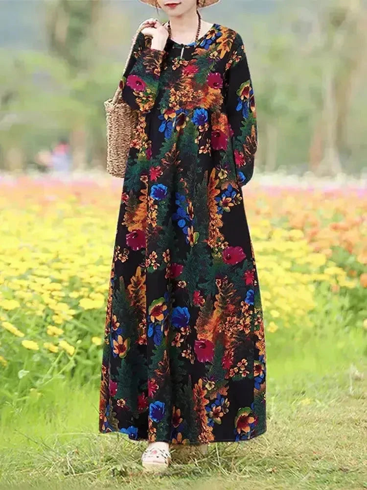 Giorgia vintage floral printed dress by Lumina Vancouver, featuring a blue floral pattern and a fitted silhouette.