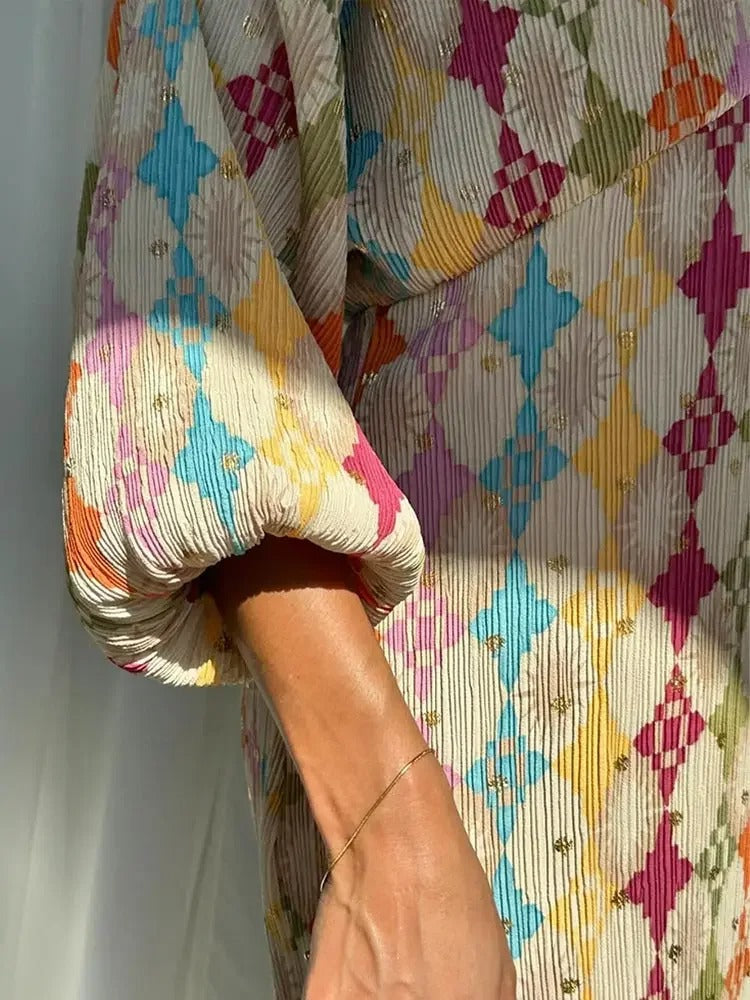 Colorful relaxed fit two-piece casual set by Lumina Wear, featuring a stylish top and matching pants for a comfortable look.