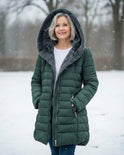 Dark green fleece-lined puffer jacket by Lumina Wear, featuring a flattering fit and stylish design.