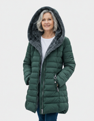 Dark green Lumina Wear fleece-lined puffer jacket featuring a flattering fit and stylish design, perfect for cold weather.